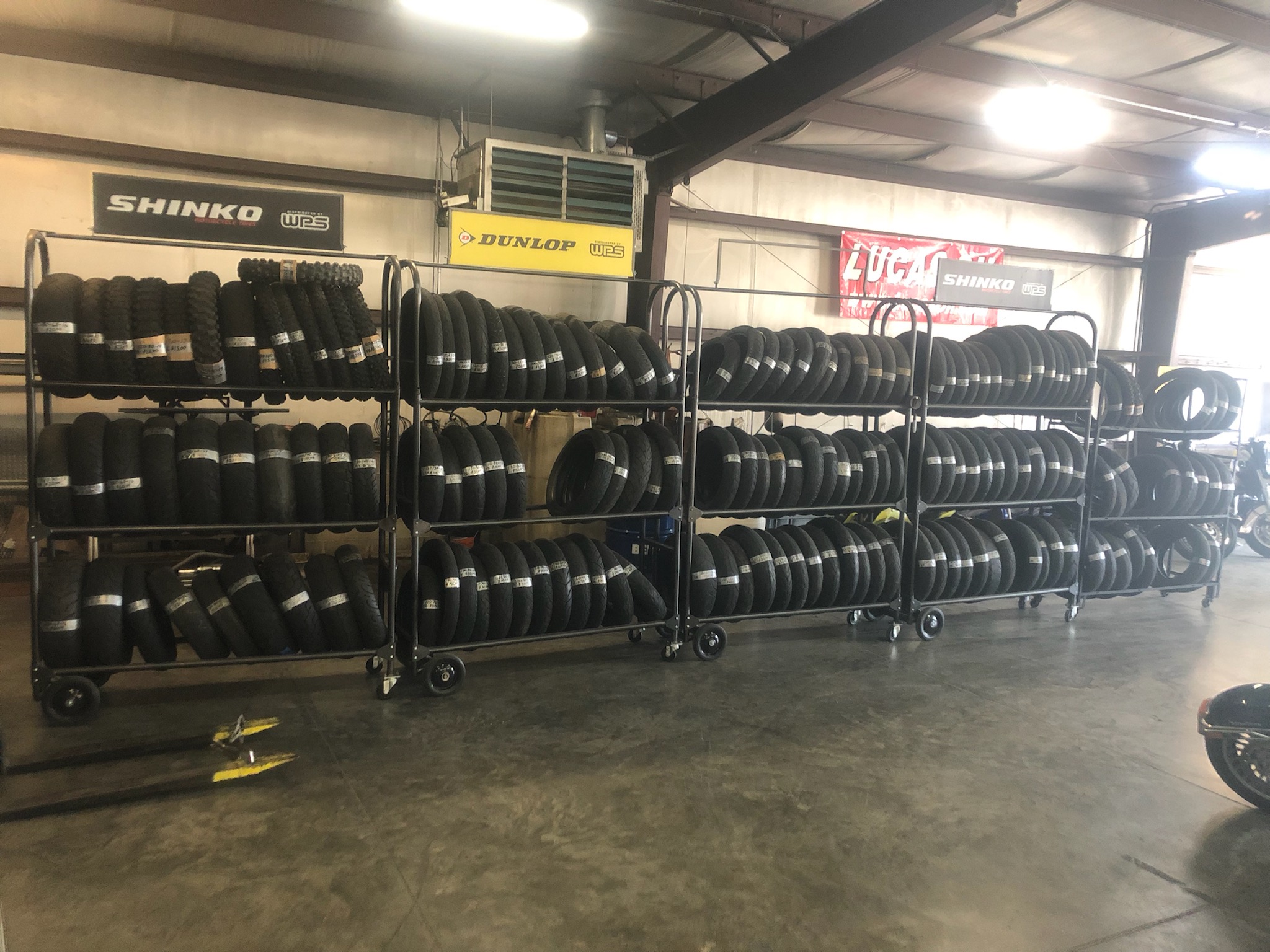 Motorcycle tire racks at Racers Edge